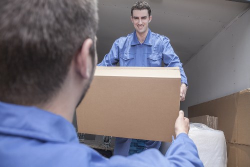 Local removals crew loading a van for a Brompton property move