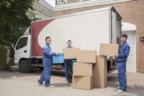 Loading furniture into a removal truck for a Brompton property move