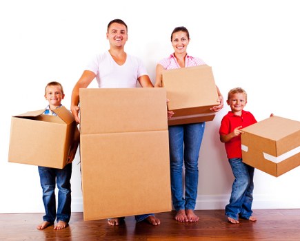 Moving boxes and wrapped furniture during a Brompton relocation