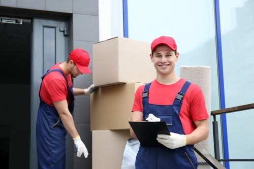 Moving van and packed boxes representing a Brompton Removals price estimate
