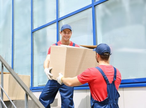 Moving boxes and furniture with a Brompton removal van