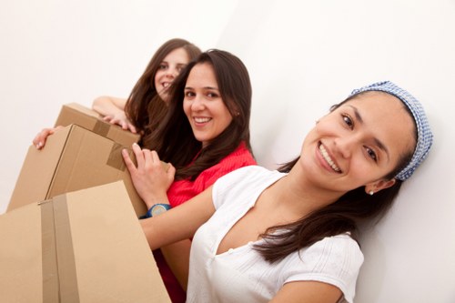 Loading furniture into a moving truck in Brompton