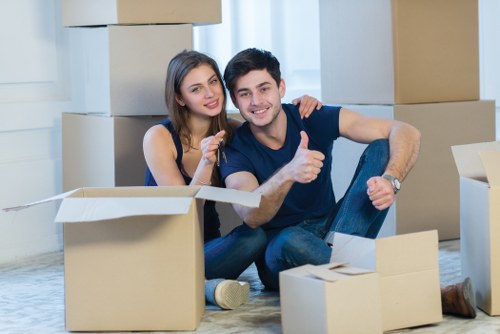 Trained removals staff handling belongings with care